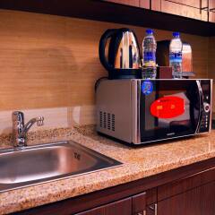 Milestone Hotel Apartments в номере