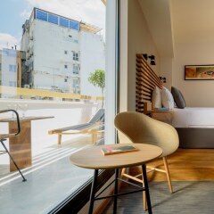 Отель Fos DownTown Suites Афины комната для гостей фото 13