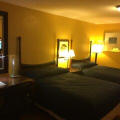 Отель Dragon Inn & Suites комната для гостей