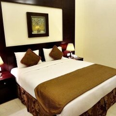 Arabian Dreams Deluxe Hotel Apartments сейф в номере