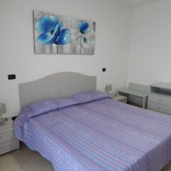 Отель AffittaSardegna - Gemelli Apartments Италия, Альгеро - отзывы, цены и фото номеров - забронировать отель AffittaSardegna - Gemelli Apartments онлайн комната для гостей фото 4