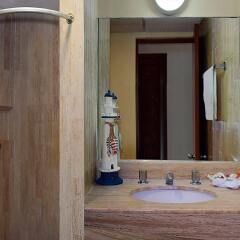 Отель Villas Tiburon by The Beach ванная фото 2