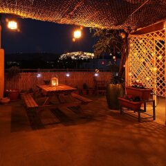 Отель Romantic Apt with Penthouse & Acropolis View бассейн