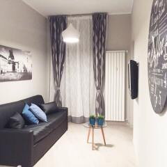 Апартаменты Torino Suite комната для гостей
