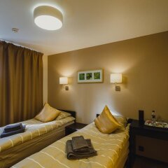 Мини-Отель Rooms & Breakfast Мурманск комната для гостей фото 3