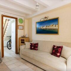 Апартаменты Apartment Gioiello Сиракуза комната для гостей фото 2