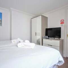 Апартаменты Celebrity Apartments Brighton Queens комната для гостей фото 5