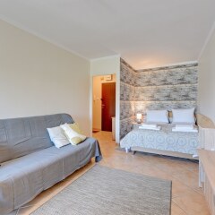 Апартаменты Lion Apartments -Muszelka Сопот комната для гостей фото 3