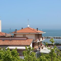 Отель Residence Cigno Италия, Римини - отзывы, цены и фото номеров - забронировать отель Residence Cigno онлайн пляж