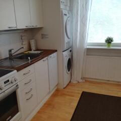 Апартаменты Kotimaailma Apartments Jyväskylä Ювяскюля в номере