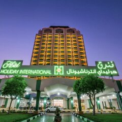 Отель Holiday International Sharjah ОАЭ, Шарджа - 5 отзывов об отеле, цены и фото номеров - забронировать отель Holiday International Sharjah онлайн вид на фасад
