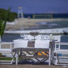 Отель Oasis Beach Hotel Греция, Агистри - отзывы, цены и фото номеров - забронировать отель Oasis Beach Hotel онлайн гостиничный бар