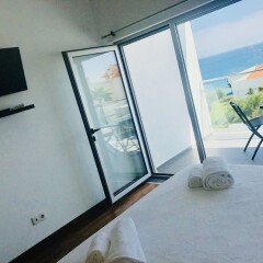 Отель Modern beach view townhouse фитнесс-зал