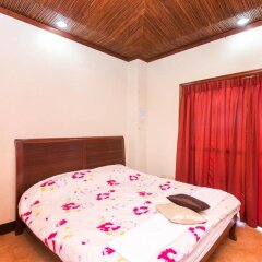 Отель MC Mountain Home Apartelle Филиппины, Тагайтай - отзывы, цены и фото номеров - забронировать отель MC Mountain Home Apartelle онлайн комната для гостей фото 5