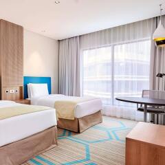 Отель Holiday Inn Doha - The Business Park комната для гостей