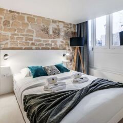 Отель Spacious and Charming Flat on île de la Cité Франция, Париж - отзывы, цены и фото номеров - забронировать отель Spacious and Charming Flat on île de la Cité онлайн комната для гостей фото 3