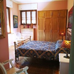 Апартаменты Villa DaVinci - Garden Apartment Вербания комната для гостей фото 5
