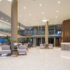 Отель Portes Lithos Luxury Resort Греция, Неа Моуданья - отзывы, цены и фото номеров - забронировать отель Portes Lithos Luxury Resort онлайн интерьер отеля