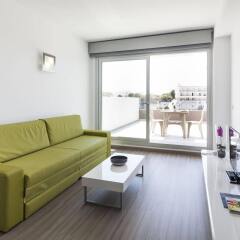 Апартаменты AxelBeach Ibiza Suites Apartments Spa and Beach Club - Adults Only комната для гостей фото 4