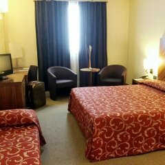 Отель MH Hotel Piacenza Fiera Италия, Пьяченца - отзывы, цены и фото номеров - забронировать отель MH Hotel Piacenza Fiera онлайн комната для гостей фото 4