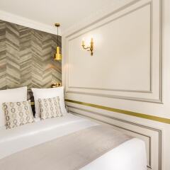 Отель Sunshine 2 bedroom - Luxury at Louvre Париж комната для гостей фото 5