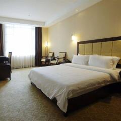 Dong Yi Business Hotel комната для гостей фото 2