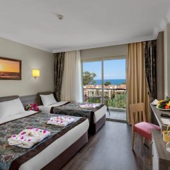Crystal Aura Beach Resort & Spa – All Inclusive Турция, Кемер - 4 отзыва об отеле, цены и фото номеров - забронировать отель Crystal Aura Beach Resort & Spa – All Inclusive онлайн комната для гостей фото 2