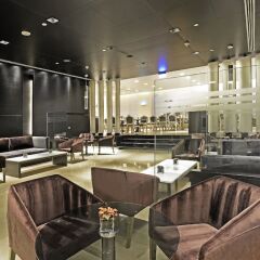 Отель The Boulevard Arjaan by Rotana гостиничный бар