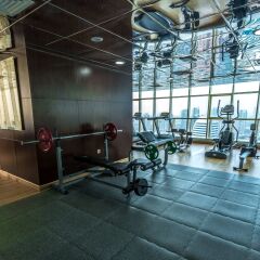 First Central Hotel Suites фитнесс-зал фото 4