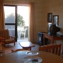Отель Odysseus Court Gozo Мальта, Мунксар - отзывы, цены и фото номеров - забронировать отель Odysseus Court Gozo онлайн комната для гостей фото 5