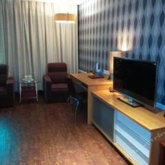Yijia Holiday Hotel удобства в номере