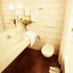 FourSide Hotel Salzburg Зальцбург ванная