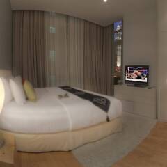 Отель Golden Triangle Suites by Mondo комната для гостей