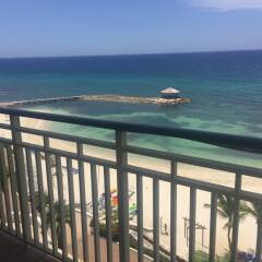 Отель Palmyra Luxury Beach Condo балкон