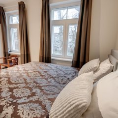 Отель Daily Apartments Cosy 2 Floor Apartment Эстония, Таллин - отзывы, цены и фото номеров - забронировать отель Daily Apartments Cosy 2 Floor Apartment онлайн комната для гостей
