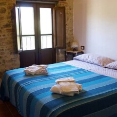 Отель La Pietra Rara B&B Монтоне комната для гостей фото 2