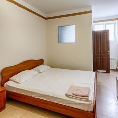 Гостиница Круиз на Серафимовича комната для гостей фото 2