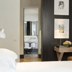 Отель Portrait Suites комната для гостей фото 2