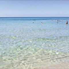Отель La Casarana Resort & Spa Италия, Пресичче - отзывы, цены и фото номеров - забронировать отель La Casarana Resort & Spa онлайн пляж