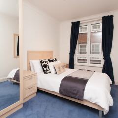 Отель Central London 2 Bedroom Flat комната для гостей