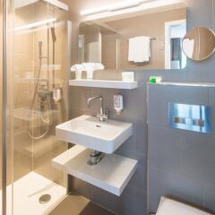 Отель Best Western Plus Hotel Zürcherhof Швейцария, Цюрих - отзывы, цены и фото номеров - забронировать отель Best Western Plus Hotel Zürcherhof онлайн ванная фото 2