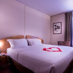 L'HOTEL PERGOLESE Paris комната для гостей фото 5