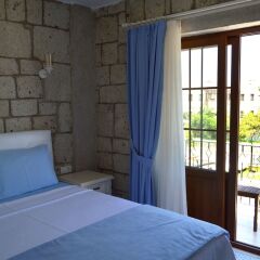 Отель Fehmi Bey Alacati Butik Otel - Special Class Чешме комната для гостей фото 2