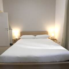 Апартаменты Santi Quattro Apartment & Rooms - Colosseo комната для гостей