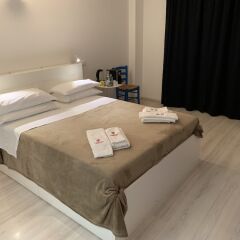 Отель Tiburtina Suites комната для гостей