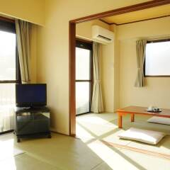 Condominium Hotel Garland Court Usami Ито комната для гостей фото 4