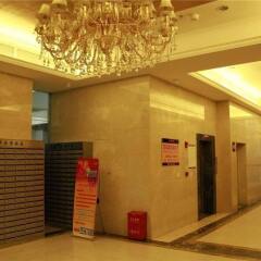 Апартаменты Xingfu Huafu Apartment интерьер отеля