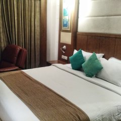 Отель Savoy Suites, Greater Noida Индия, Большая Нойда - отзывы, цены и фото номеров - забронировать отель Savoy Suites, Greater Noida онлайн комната для гостей фото 2