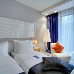 Radisson, Роза Хутор (Radisson Hotel, Rosa Khutor) комната для гостей фото 5