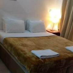 Отель Al Raein Hotel Apartments ОАЭ, Дубай - отзывы, цены и фото номеров - забронировать отель Al Raein Hotel Apartments онлайн комната для гостей фото 4
